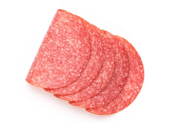 Fette di salame su sfondo bianco. — Foto Stock