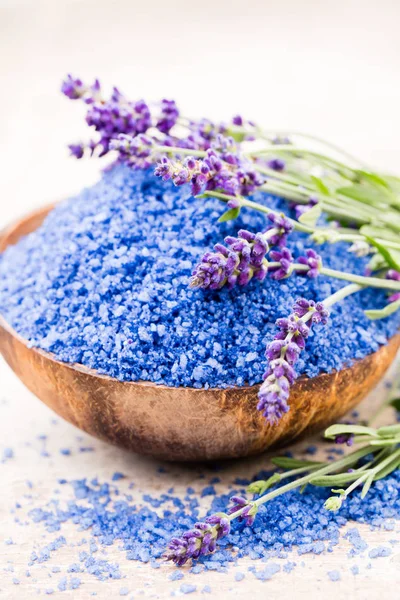 Essential lavender salt with flowers top view. — Stock Photo, Image