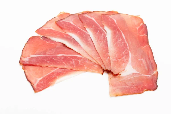 Hamon sliced on white background. Spanisch traditional meat. — Stock Photo, Image