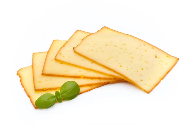 Rebanadas de queso aisladas sobre el fondo blanco . — Foto de Stock