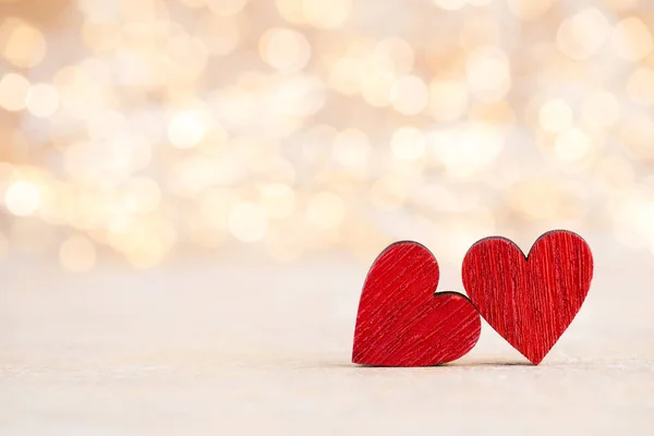 Rött hjärta bokeh bakgrund, alla hjärtans dag gratulationskort. — Stockfoto