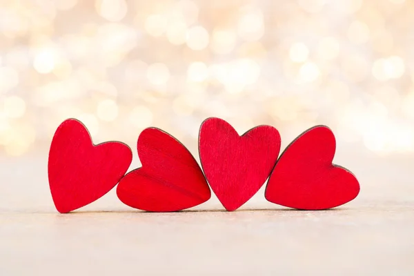Rode hart bokeh achtergrond, Valentijnsdag wenskaart. — Stockfoto