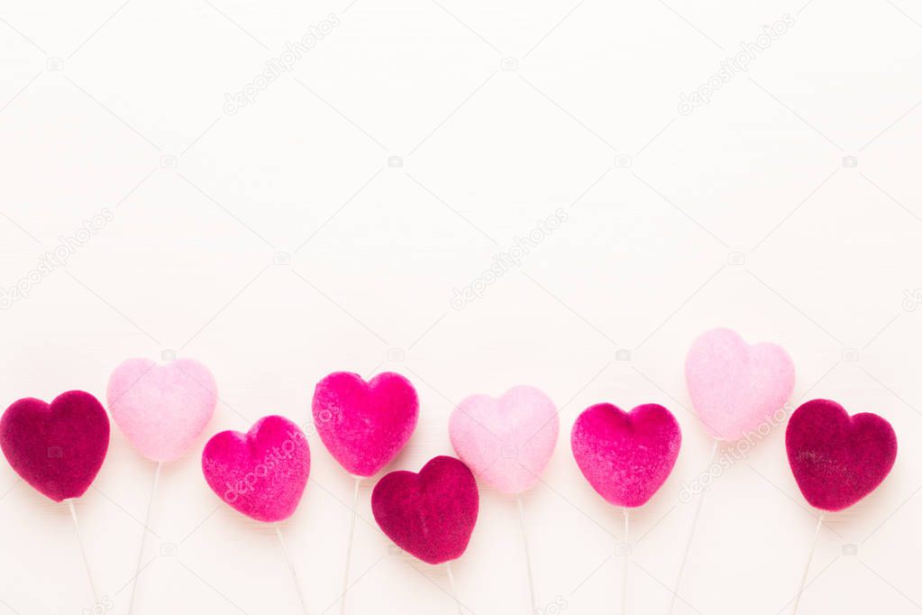 Red heart on the white wooden background.Valentines day greeting