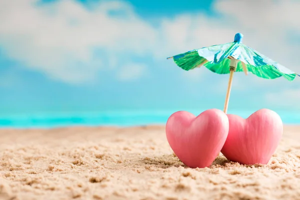Heart on the sand on the seashore. Stock Image