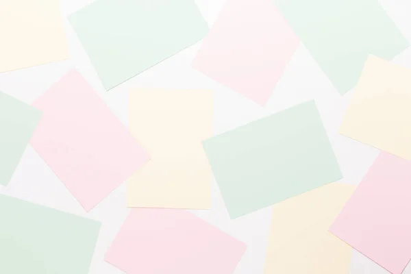 Abstract geometric background in light pastel tones from sheets — Stock Photo, Image