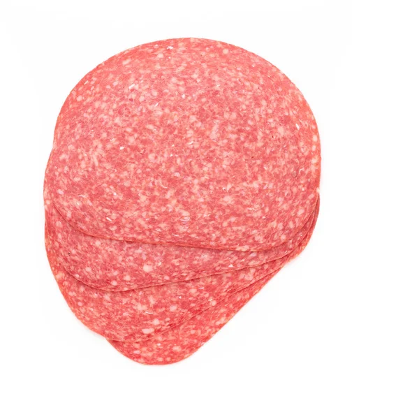 Fette di salame su sfondo bianco. — Foto Stock