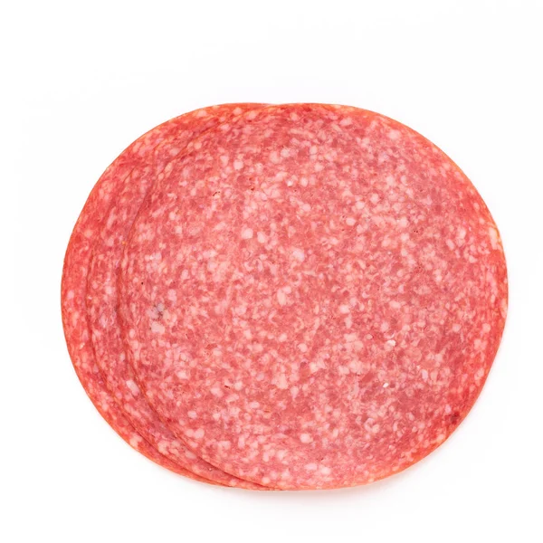 Fette di salame su sfondo bianco. — Foto Stock