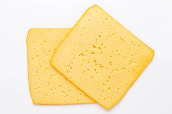 Fatia de queijo no fundo branco. — Fotografia de Stock