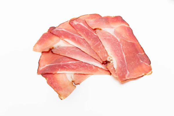 Hamon sliced on white background. Spanisch traditional meat. — Stock Photo, Image