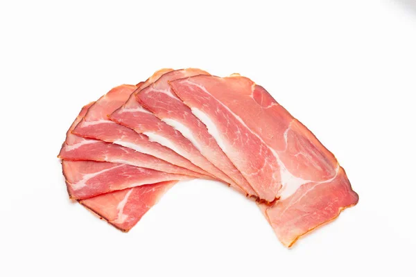 Hamon sliced on white background. Spanisch traditional meat. — Stock Photo, Image