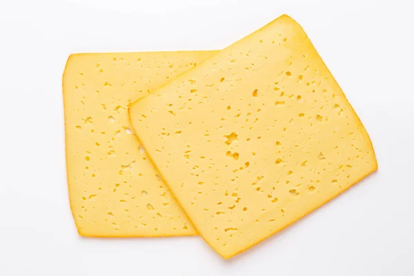 Rebanada de queso sobre fondo blanco. —  Fotos de Stock