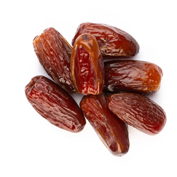 Kuru tarihler beyaz arkaplanda izole edilmiş. Üst Manzara. Düz yatıyordu.