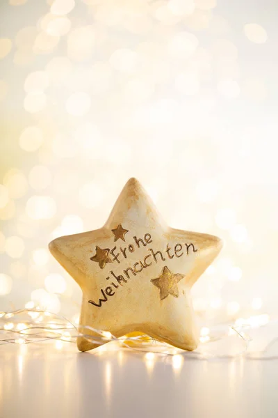 Fundo bokeh Natal com estrela decorativa . — Fotografia de Stock