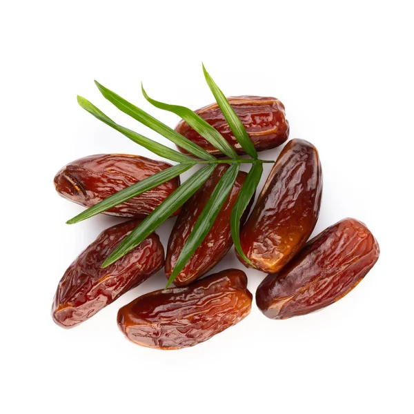 Kuru tarihler beyaz arkaplanda izole edilmiş. Üst Manzara. Düz yatıyordu.