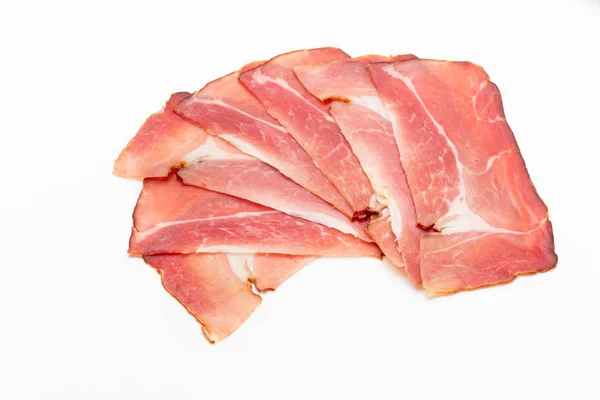 Hamon sliced on white background. Spanisch traditional meat. — Stock Photo, Image