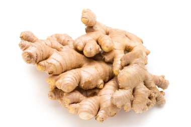 Beyaz arka planda zencefil ve limon.