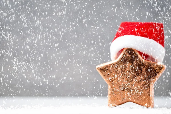 Bronz Yıldız und Noel Baba şapkası. Noel desen. Üzerinde arka plan 