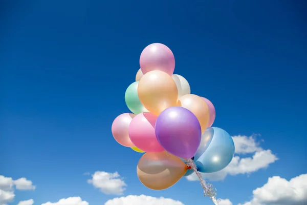 Vintage heart balloon with colorful on blue sky concept of love