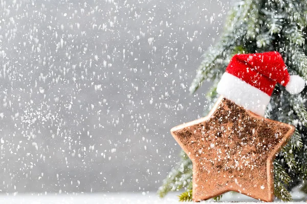 Bronz Yıldız und Noel Baba şapkası. Noel desen. Üzerinde arka plan 