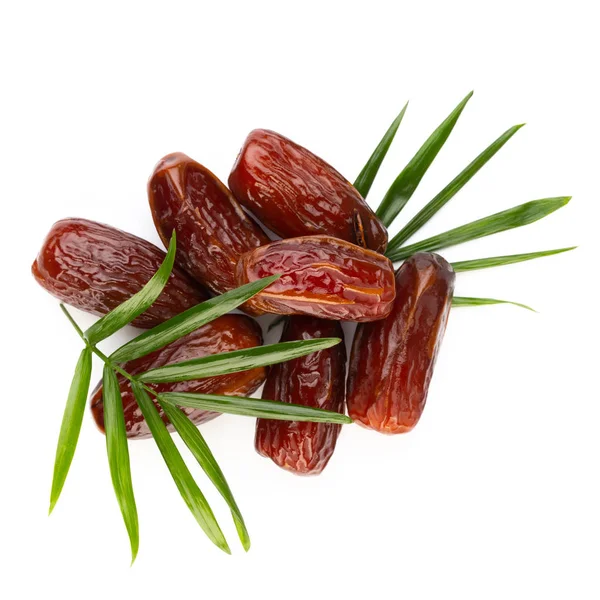 Kuru tarihler beyaz arkaplanda izole edilmiş. Üst Manzara. Düz yatıyordu.