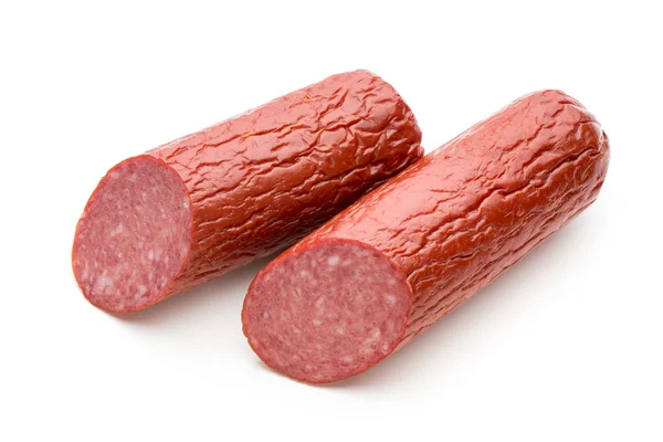Salami smoked sausage, basil leaves on white background cutout. — Stock Photo, Image