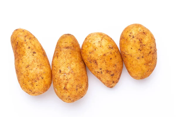 Batatas isoladas sobre fundo branco. Deitado. Vista superior. — Fotografia de Stock