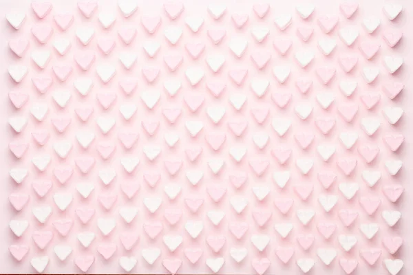 Marshmallows a rózsaszín háttér copyspace. Lapos feküdt, vagy felső — Stock Fotó