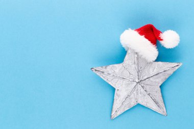 Noel yıldızı, pastel renkli arka planda dekor. Noel veya