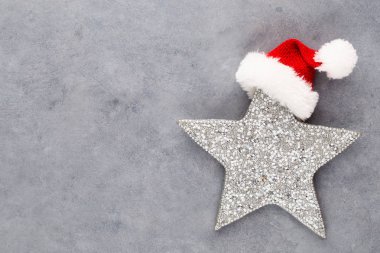 Noel yıldızı, pastel renkli arka planda dekor. Noel veya