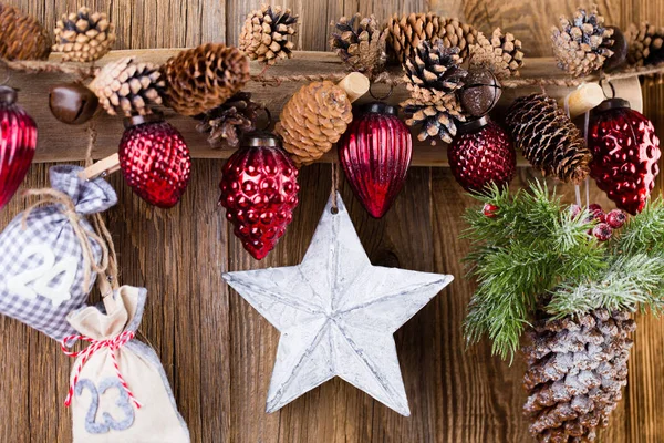 Christmas greeting card. Festive decoration on wooden background — Stock Photo, Image