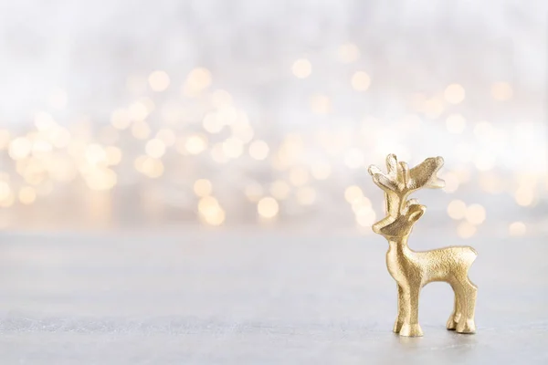 Christmas reindeer on bokeh silver background. Christmas or New — Stock Photo, Image