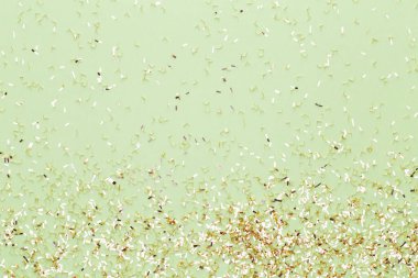 Şenlikli pastel arka plan. Noel yıldızları ve parıldayan parıltılar, pastel arka planda konfeti. Noel zamanı. Düğün için. Doğum günü. Sevgililer Günü. Düz yatıyordu.