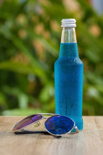 drink  stand on a table on  background