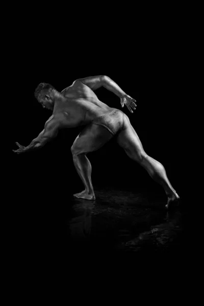 Black and white portrait Male bodybuilder posing on a white background. Photo made in the style of 