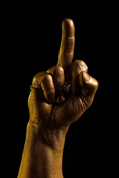 Golden hand and gesture on a black background