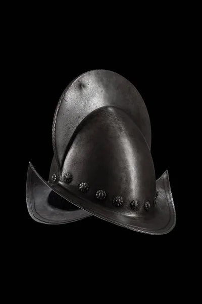 medieval knight helmet Morion on black background
