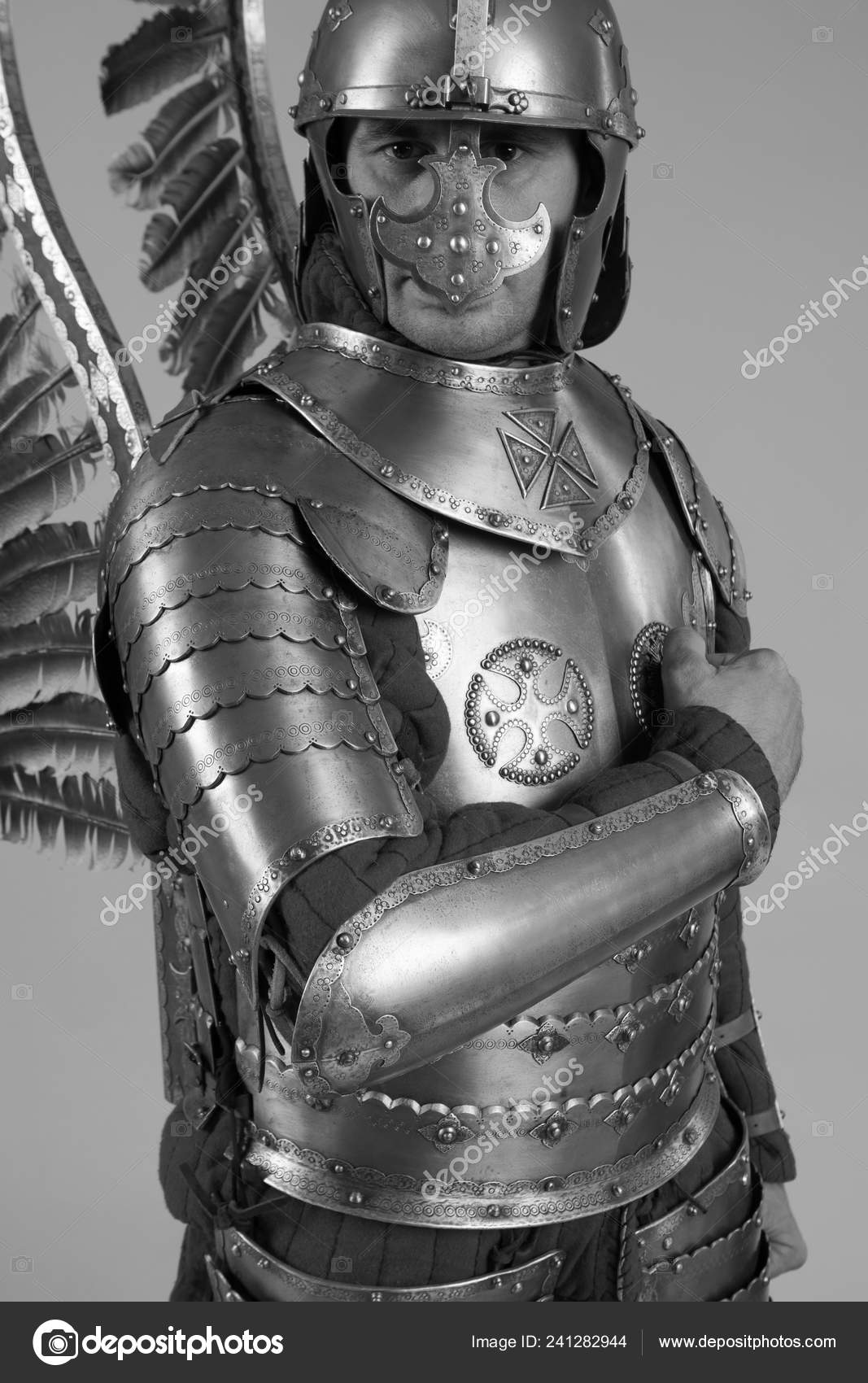 depositphotos_241282944-stock-photo-man-armor-hussar-legion-posing.jpg
