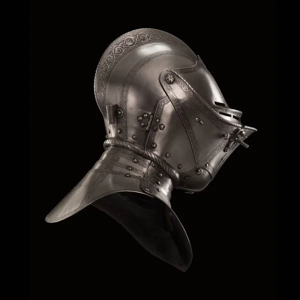 medieval knightly Italian helmet Armet, period of the 16th century, on a white background.