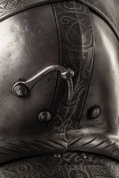 medieval knightly Italian helmet Armet, period of the 16th century, on a white background.