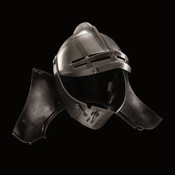 medieval knightly Italian helmet Armet, period of the 16th century, on a white background.