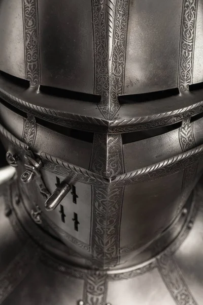 medieval knightly Italian helmet Armet, period of the 16th century, on a white background.