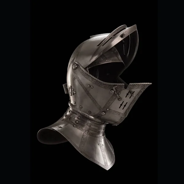 medieval knightly Italian helmet Armet, period of the 16th century, on a white background.