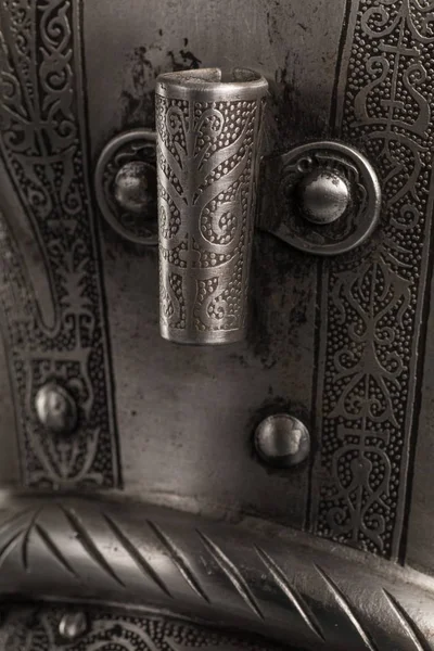 medieval knightly Italian helmet Armet, period of the 16th century, on a white background.