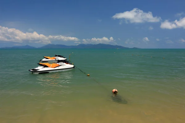 Sunny day, sea landscape beach and boats