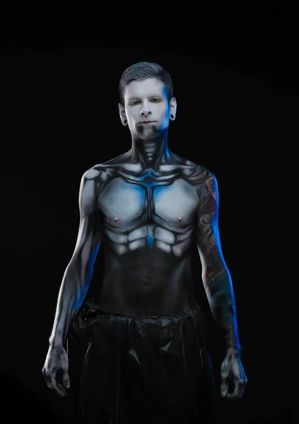 Character for computer game Bodyart cyborg, male with pattern on body on black background