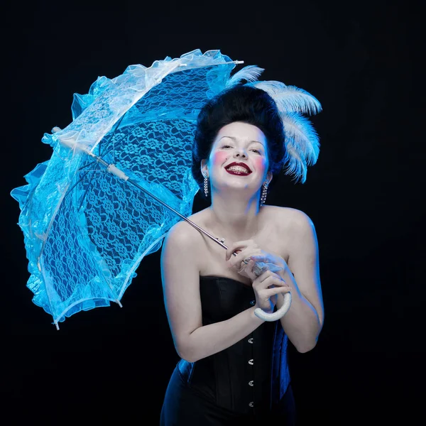 emotional actress brunette woman with pale skin in role of vampire on black background