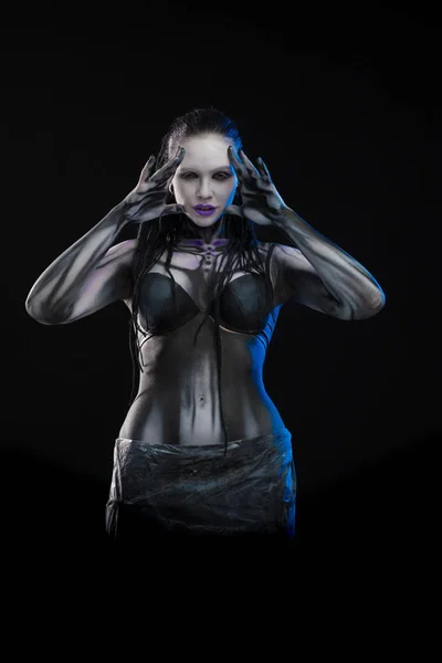 Character for computer game Body painting cyborg, woman with pattern on body on black background
