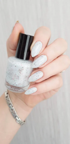 Female hand with long nails with white nail polish - Stock Image - Everypixel Female hand with long nails with white nail polish - Stock Image - Everypixel