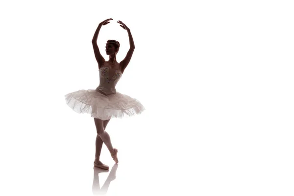 woman ballerina in white pack posing on white background, photo made in the style of \