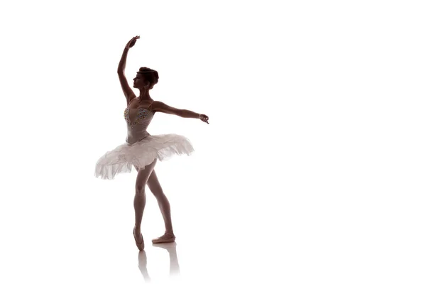 woman ballerina in white pack posing on white background, photo made in the style of \